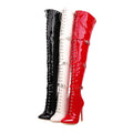Thigh high patent leather boots